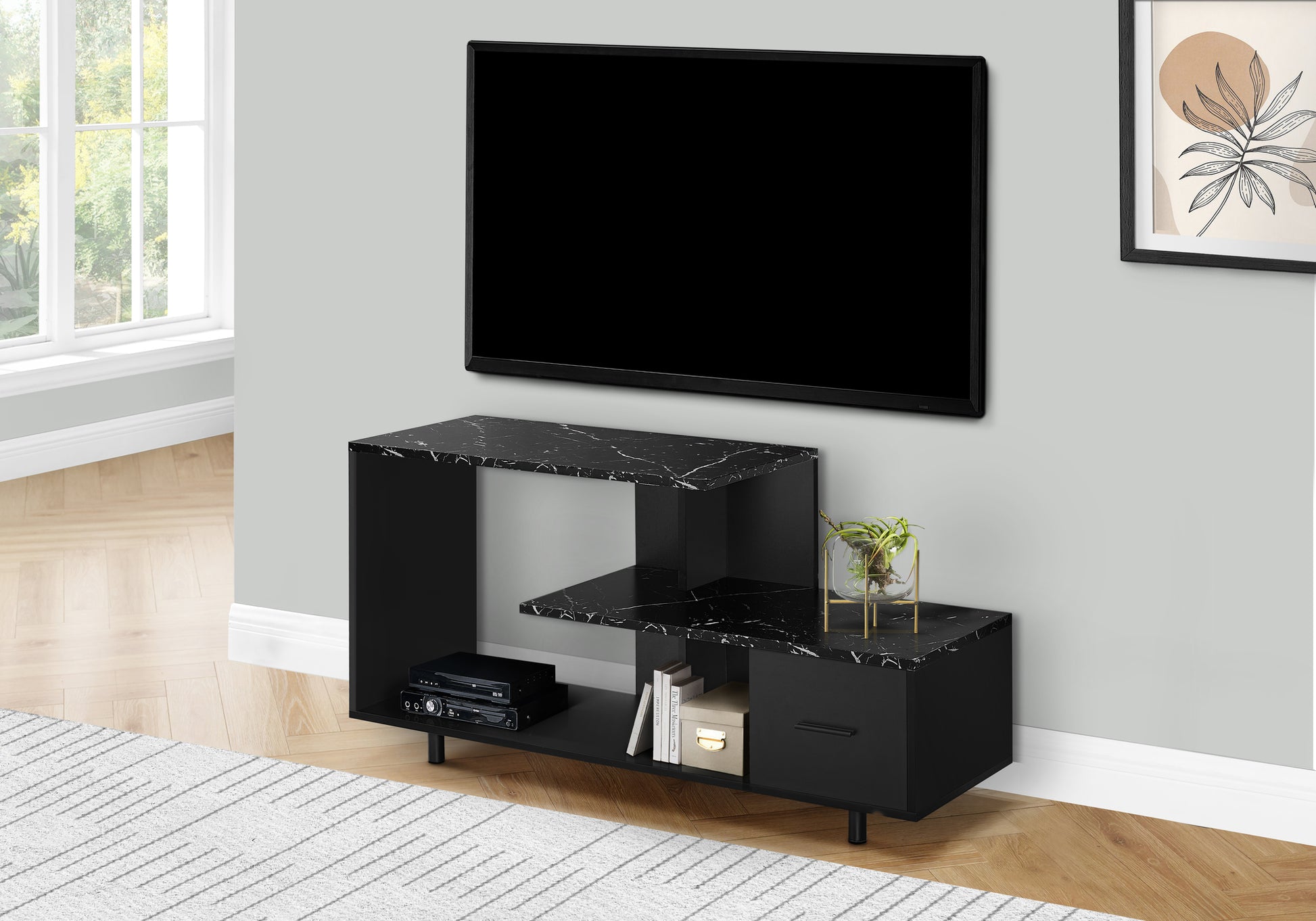 Modern black TV stand with marble finish and open shelving