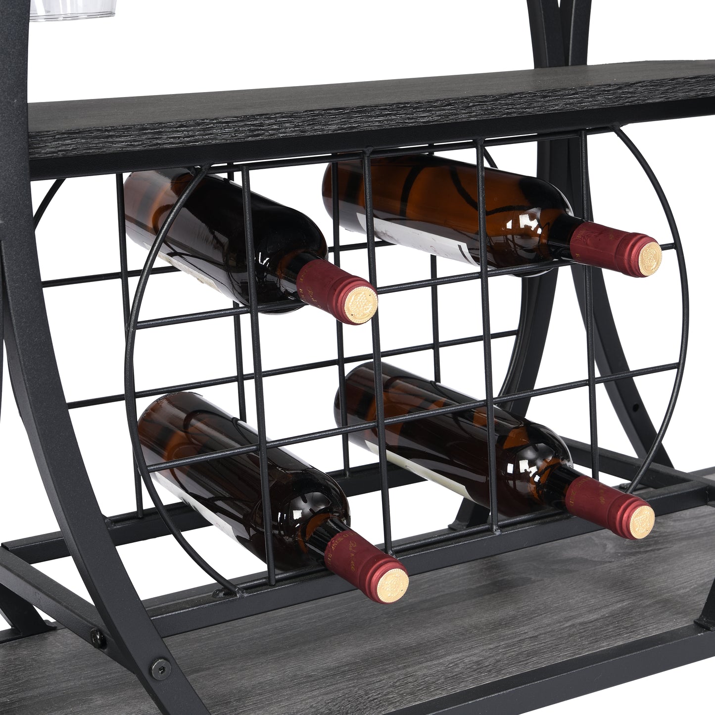 Black metal wine rack holding four bottles of red wine