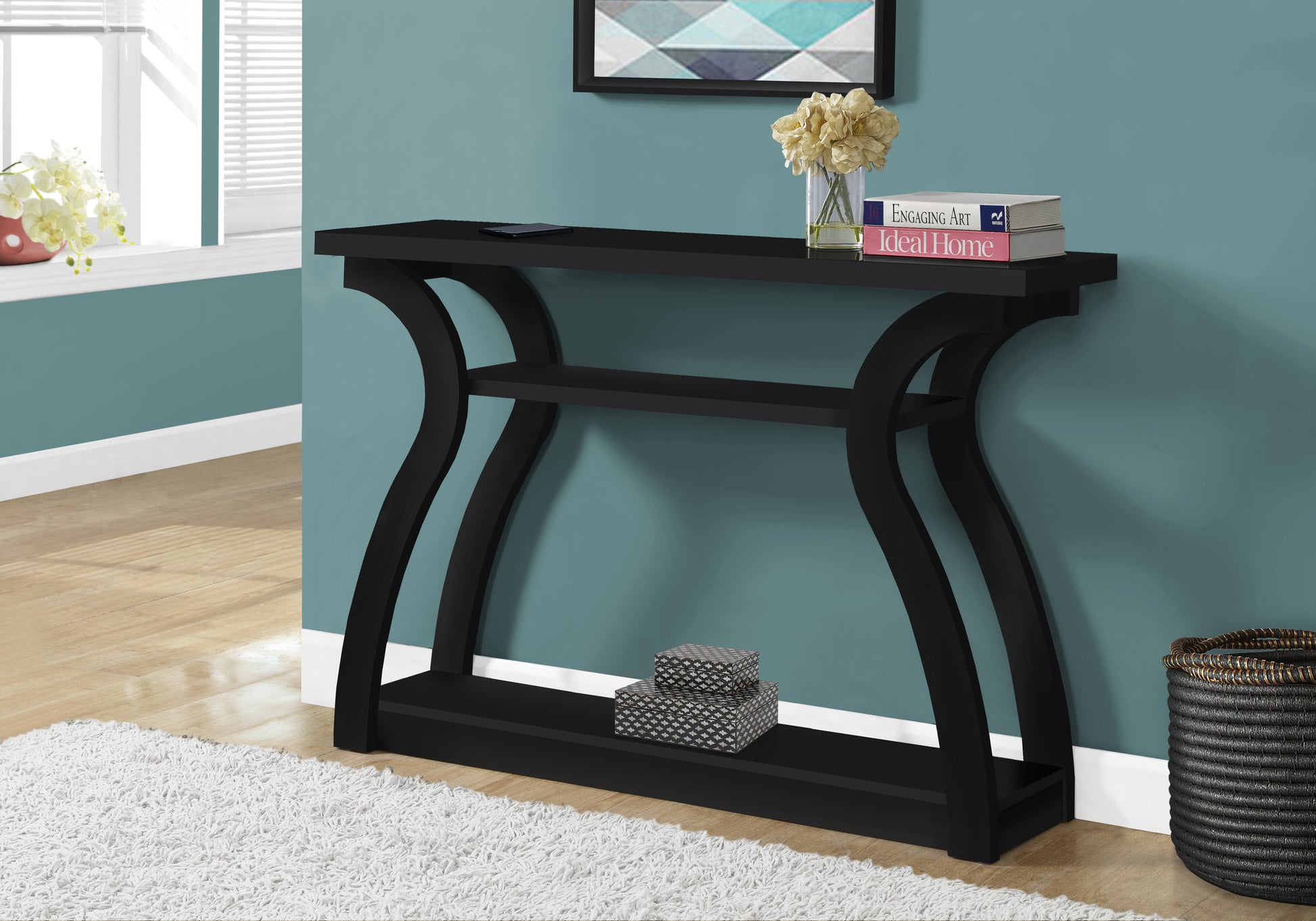 Sleek black wooden console table with curved legs ideal for hallways