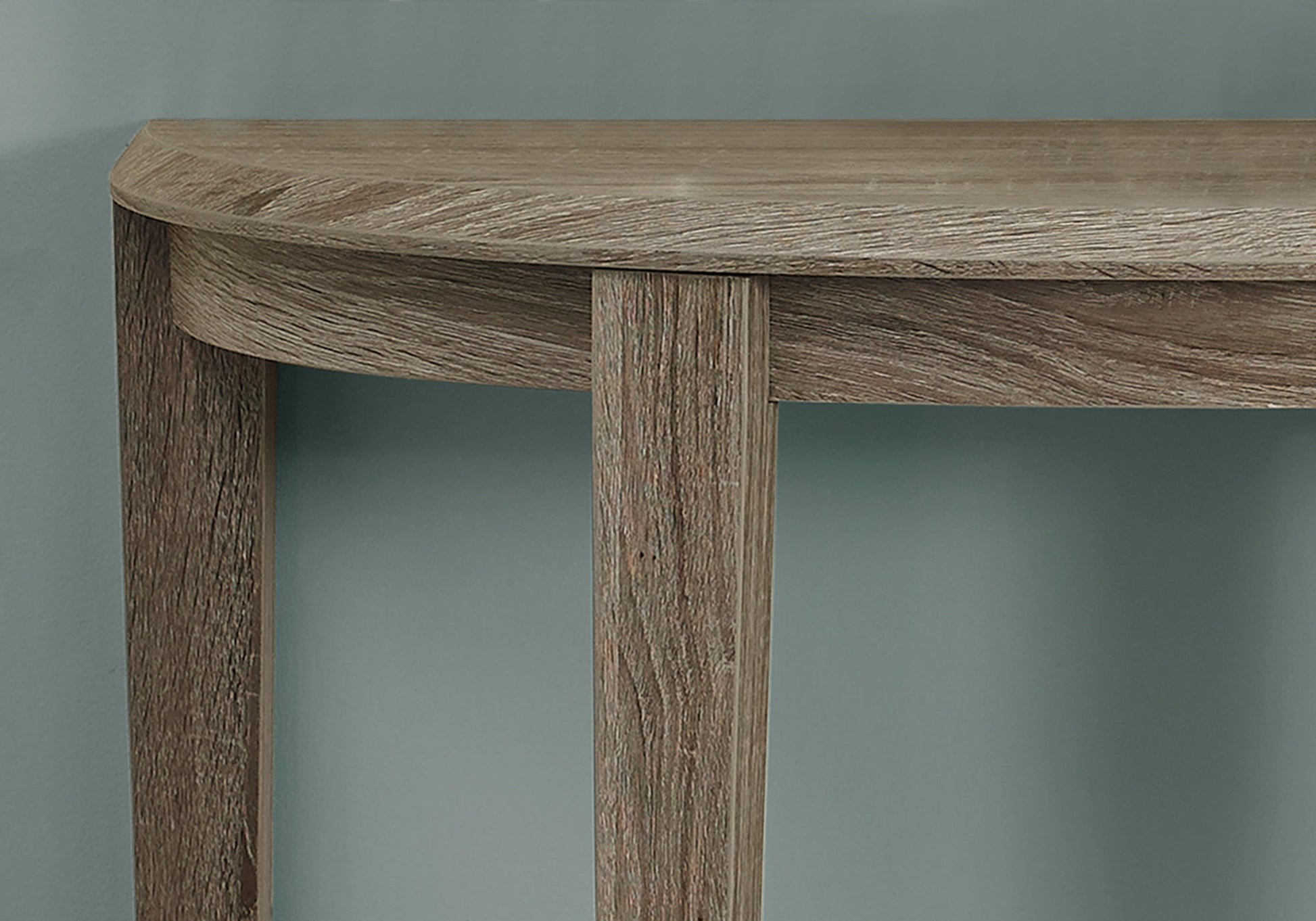 Distressed oak veneer console table with curved top and straight legs ideal for entryways