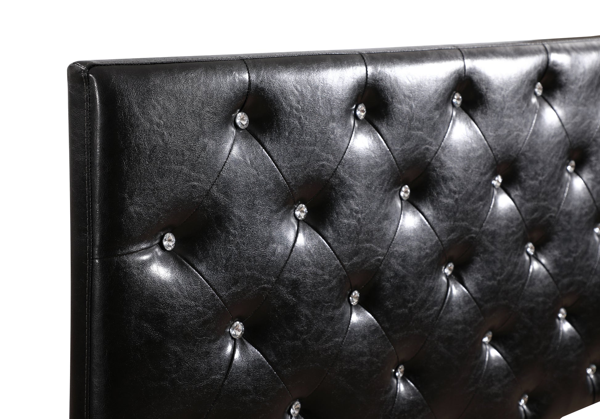 Black tufted faux leather headboard with crystal button accents for a luxurious bedroom