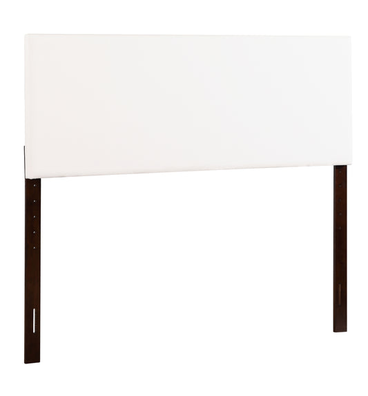 Minimalist white fabric headboard with dark wood legs for a modern bedroom