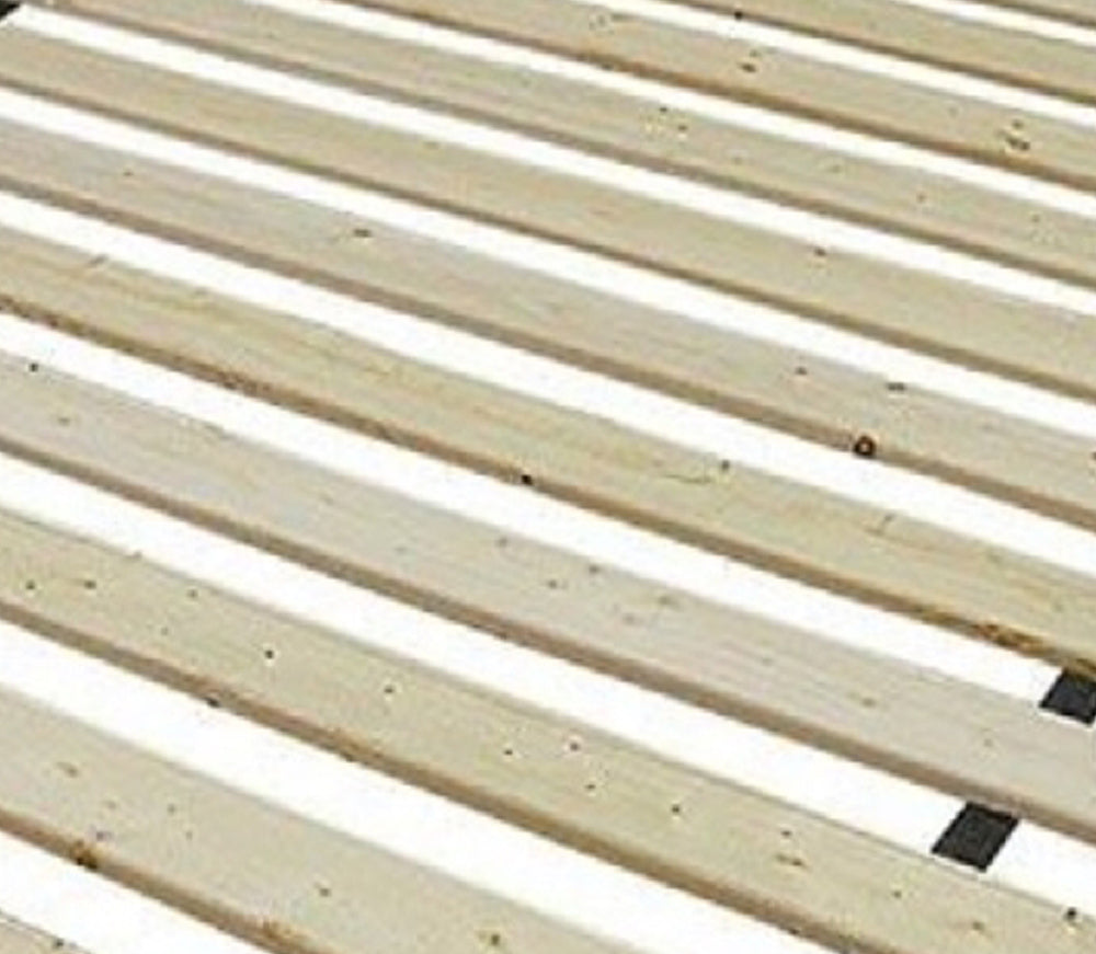 Closeup of natural pine wood bed slats essential for mattress support