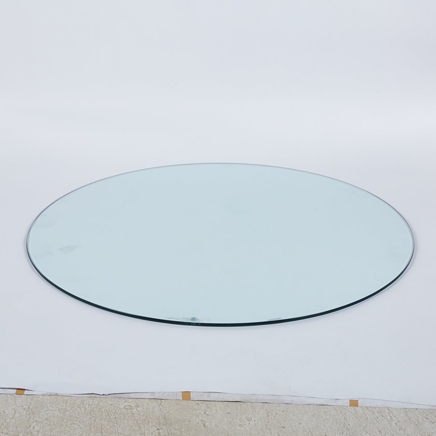 Clear glass oval tabletop with polished edge ideal for DIY projects