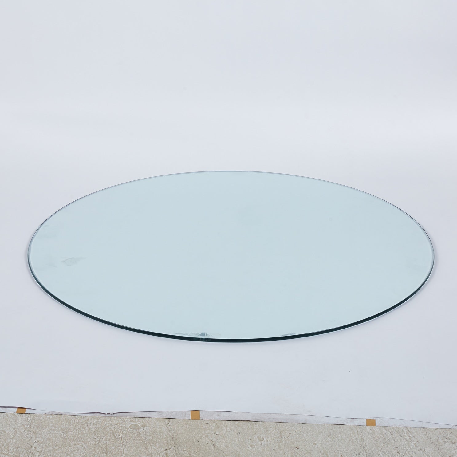 Clear glass oval tabletop with polished edge ideal for DIY projects