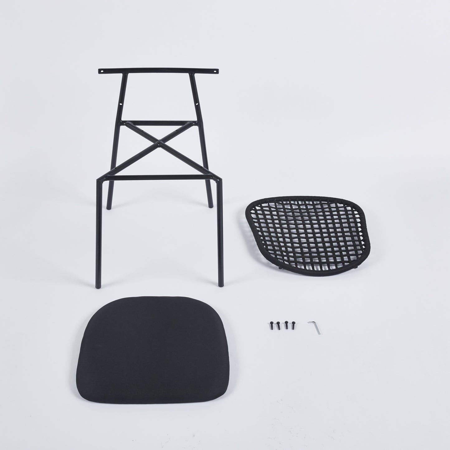 Black metal chair frame with separate cushion and seat for assembly