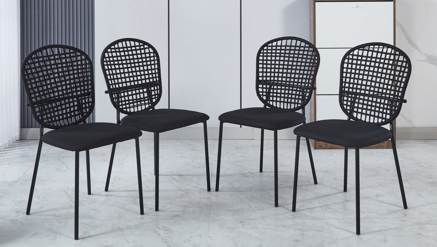 Four modern black dining chairs with woven backs and upholstered seats