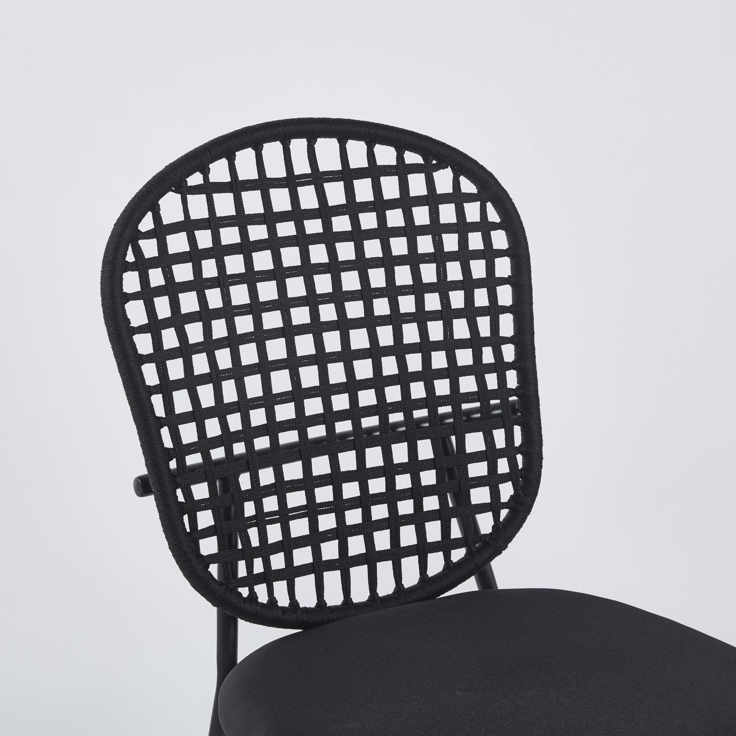 Black woven cord chair back with upholstered seat modern design for comfortable seating