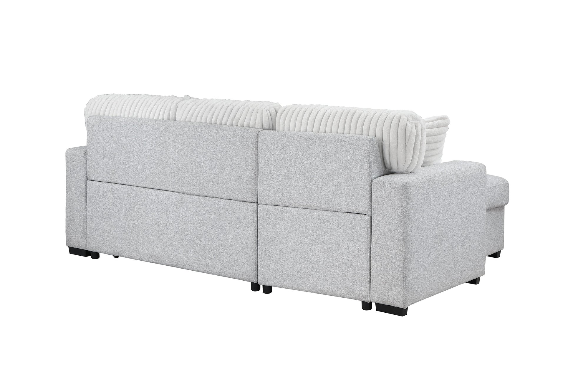 Light gray sectional sofa with plush white corduroy accent pillows modern design