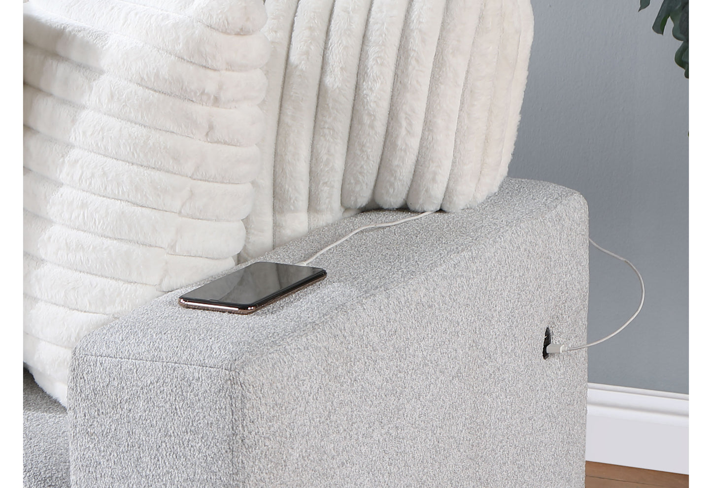 Grey textured armchair with builtin USB charging port