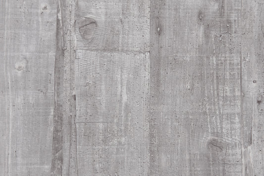 Rustic grey wood paneling with visible grain and knot detail perfect for a modern farmhouse accent wall