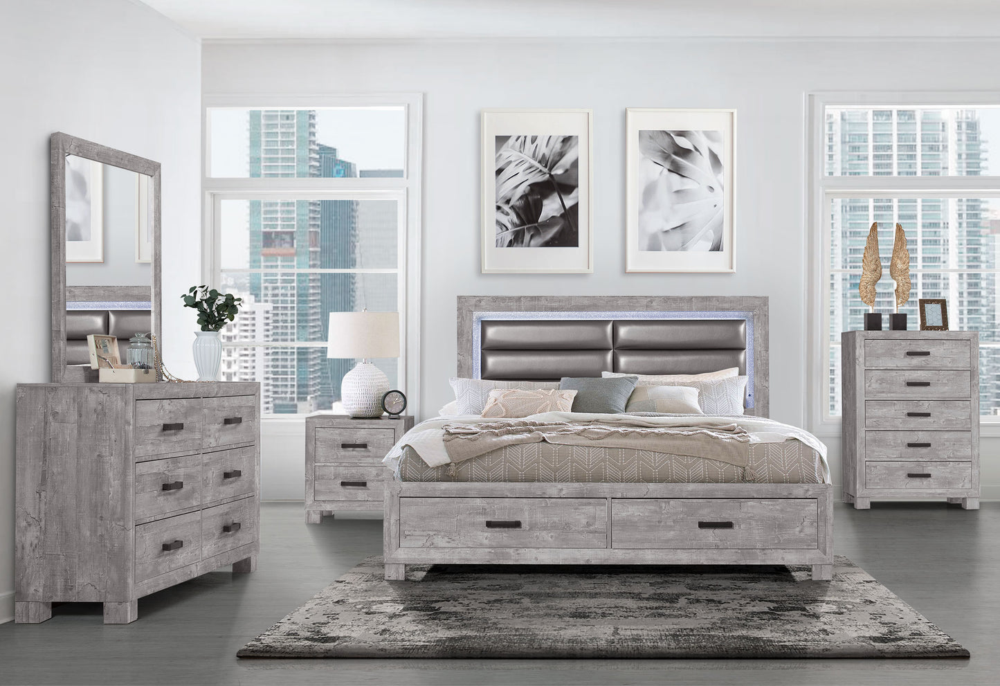 Gray distressed wood dresser with dark handles and ample storage space