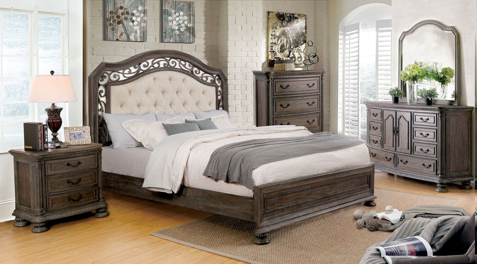 Tufted upholstered headboard bed frame with ornate carved details in a dark wood finish