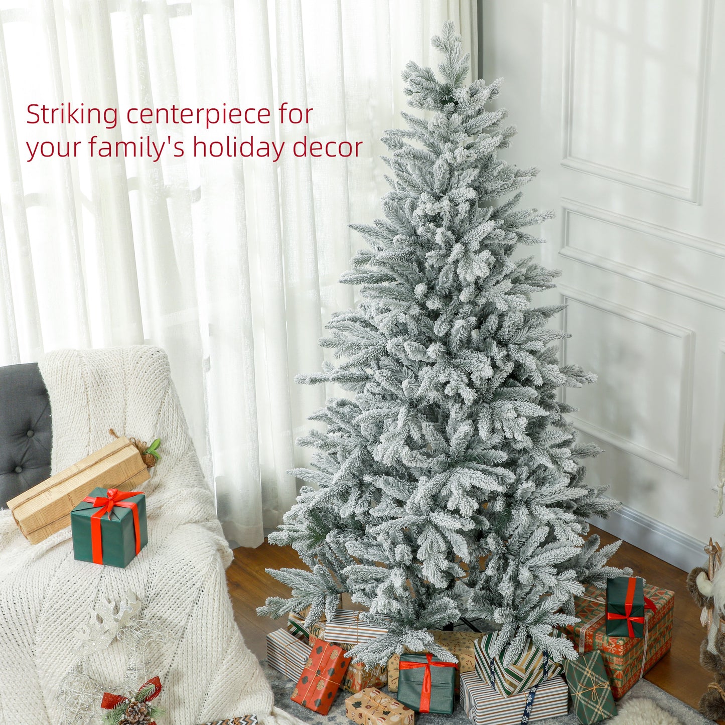 Flocked artificial Christmas tree with gifts a festive holiday centerpiece