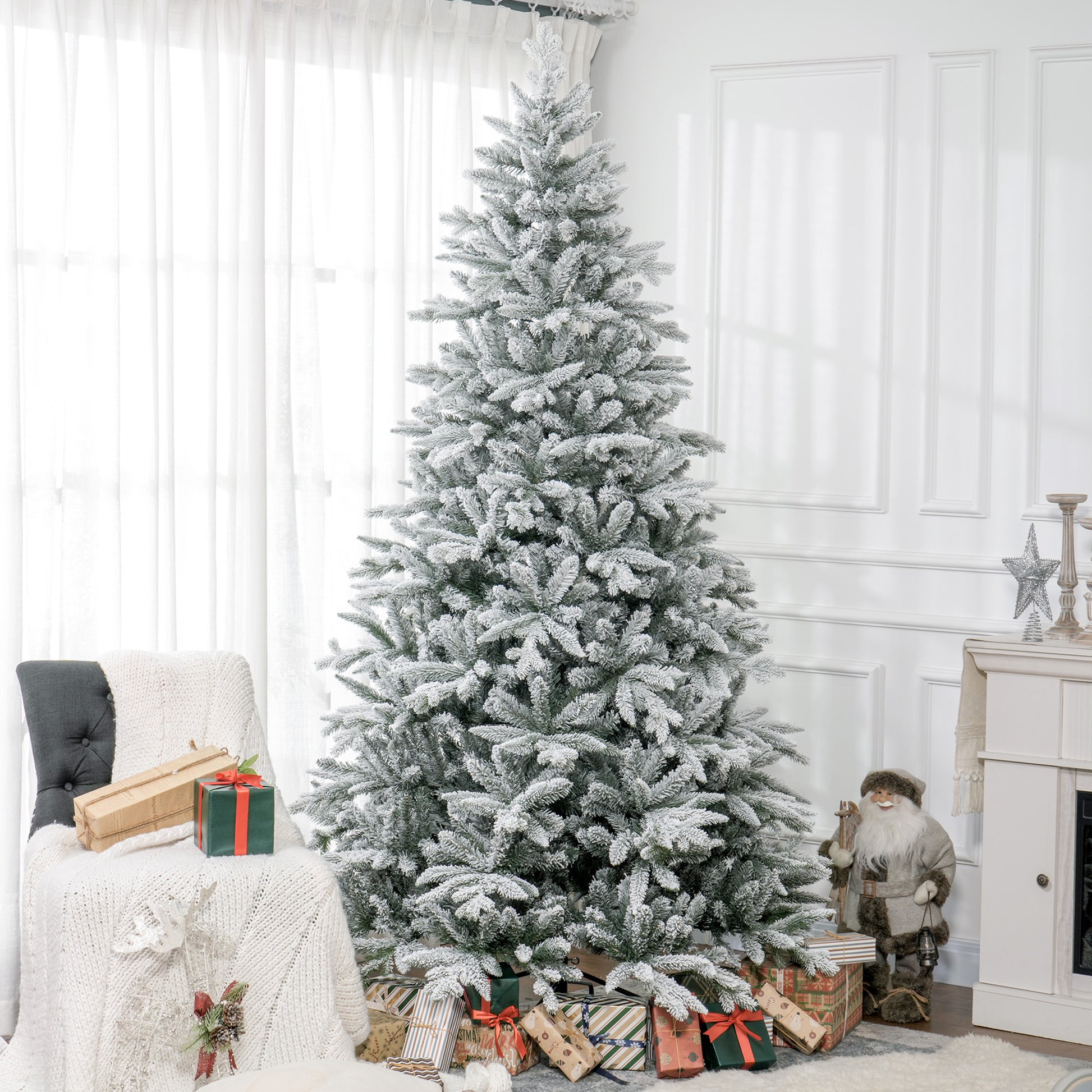 Flocked artificial Christmas tree with snowcovered branches ft tall