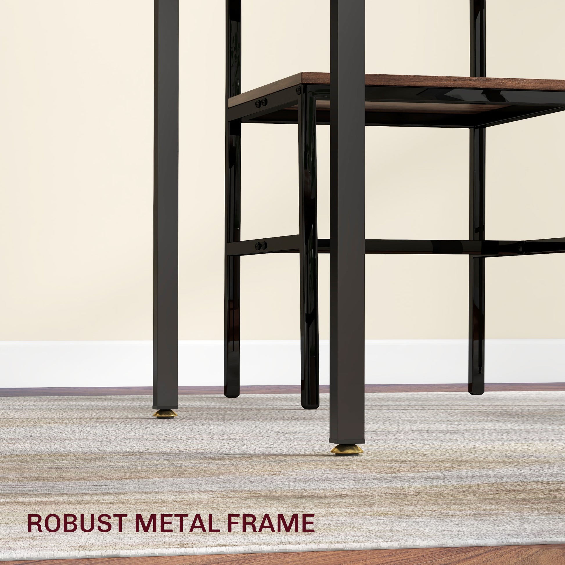 Closeup of a black metal desk frame with adjustable gold footings on a textured rug