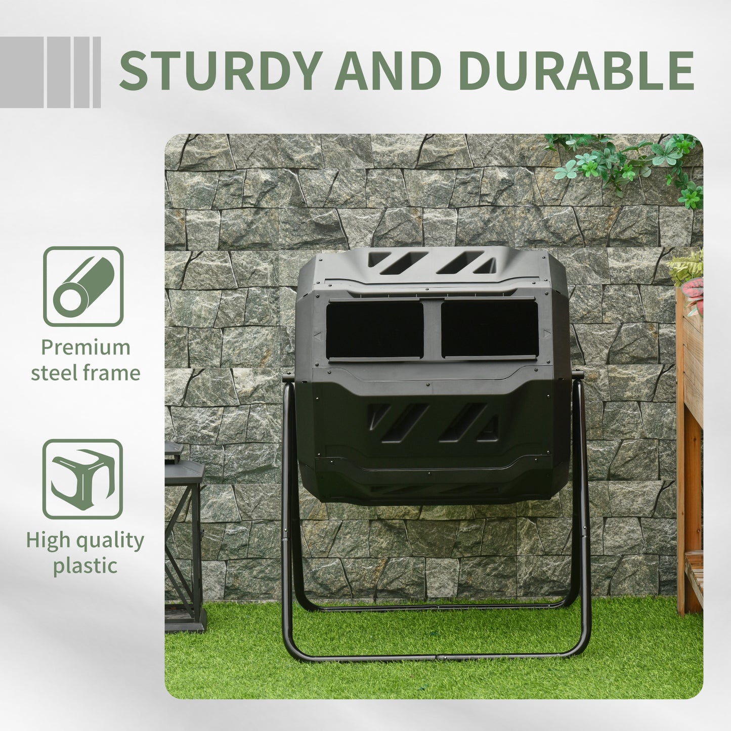 Black dualchamber tumbling composter with steel frame on green grass