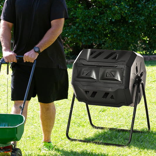 Black dualchamber tumbling composter with metal stand in sunny yard