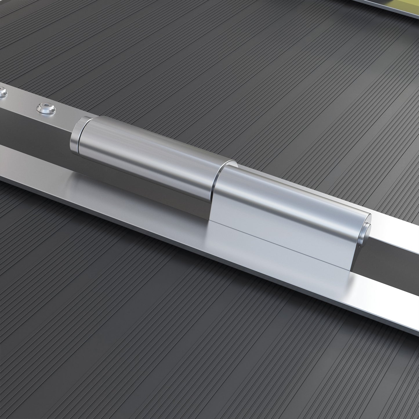 Closeup of a polished silver metal hinge with a textured dark gray rubber base suitable for industrial applications