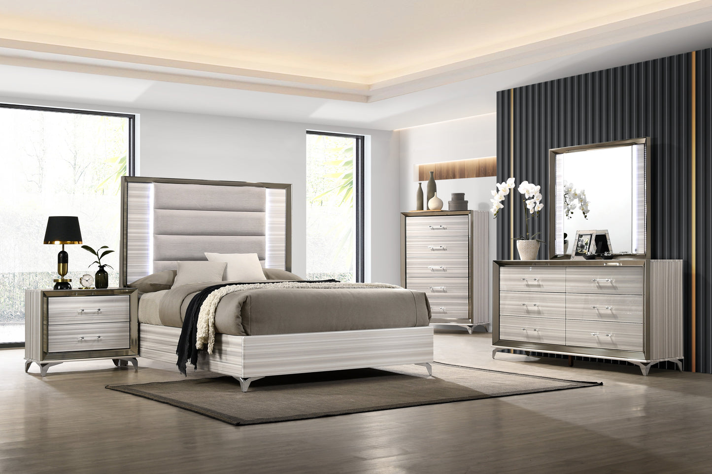 Modern grey upholstered king bed with mirrored trim and LED lighting
