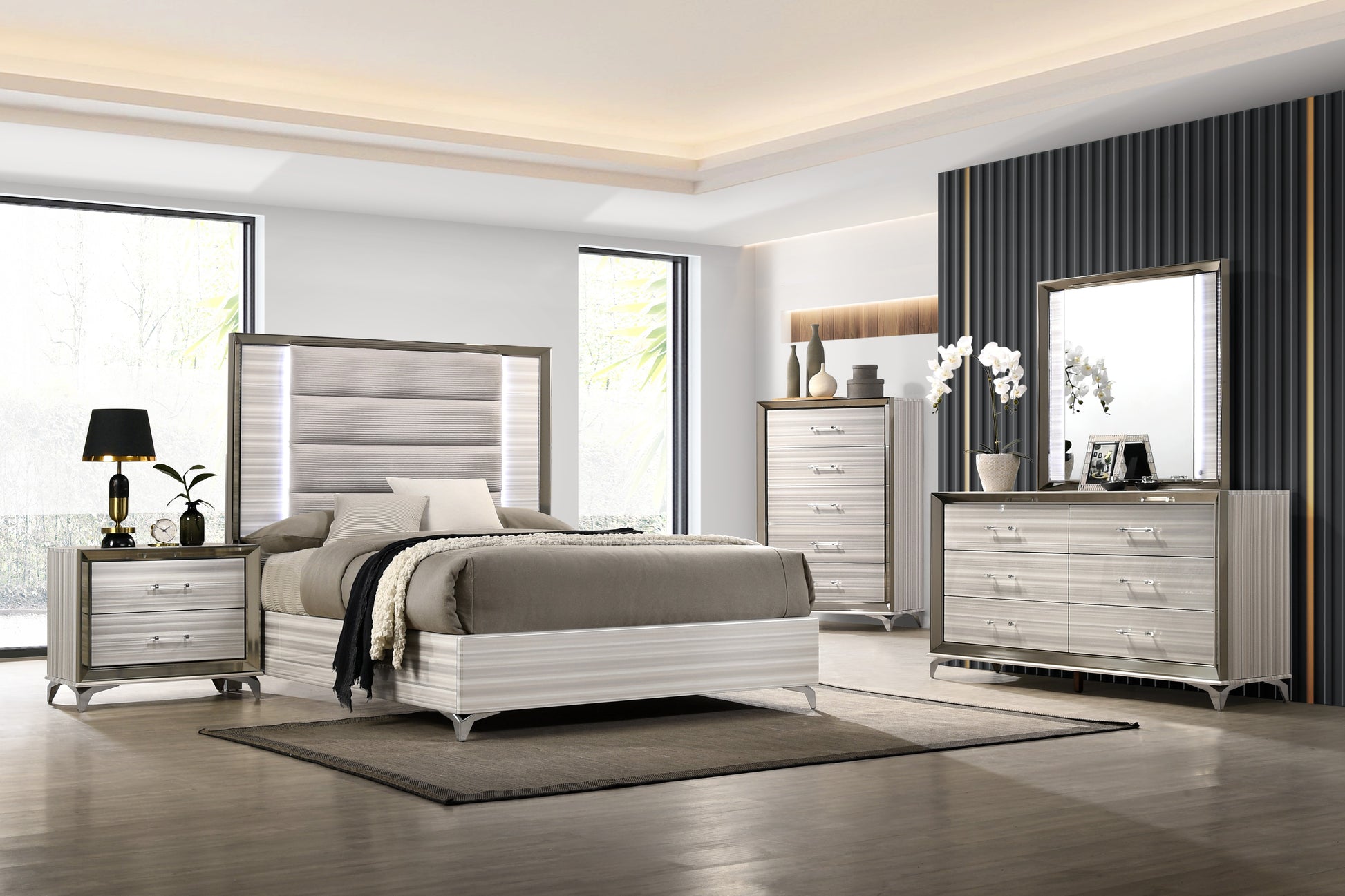 Modern grey upholstered king bed with mirrored trim and LED lighting