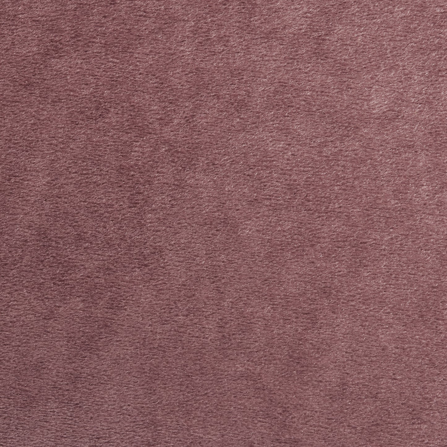 Soft rose pink velvet fabric texture ideal for upholstery and apparel projects