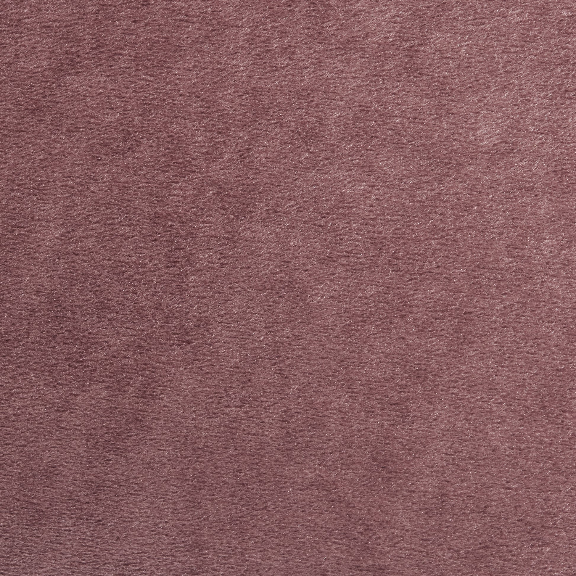 Soft rose pink velvet fabric texture ideal for upholstery and apparel projects