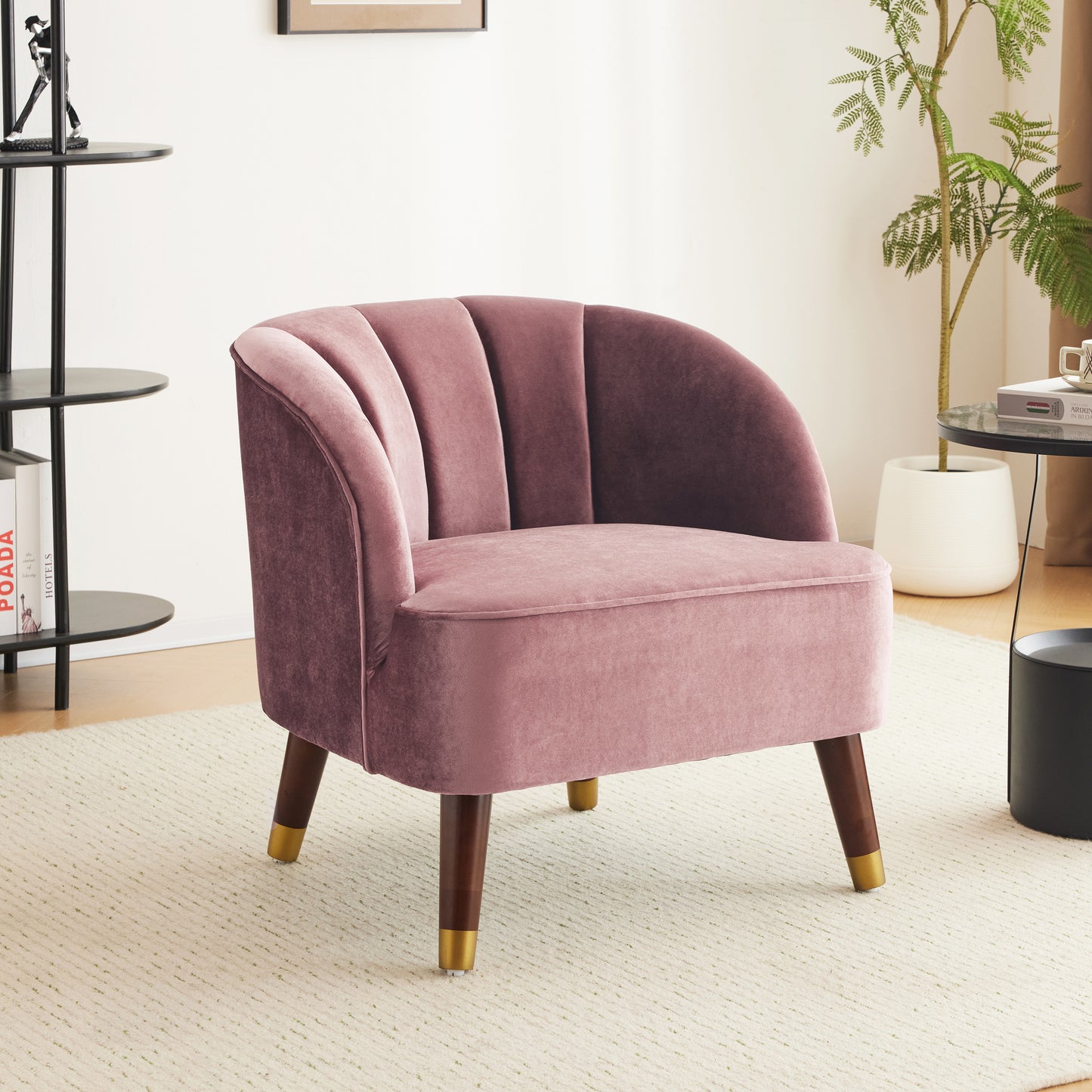 Dusty rose velvet armchair with channel tufting and goldcapped wooden legs