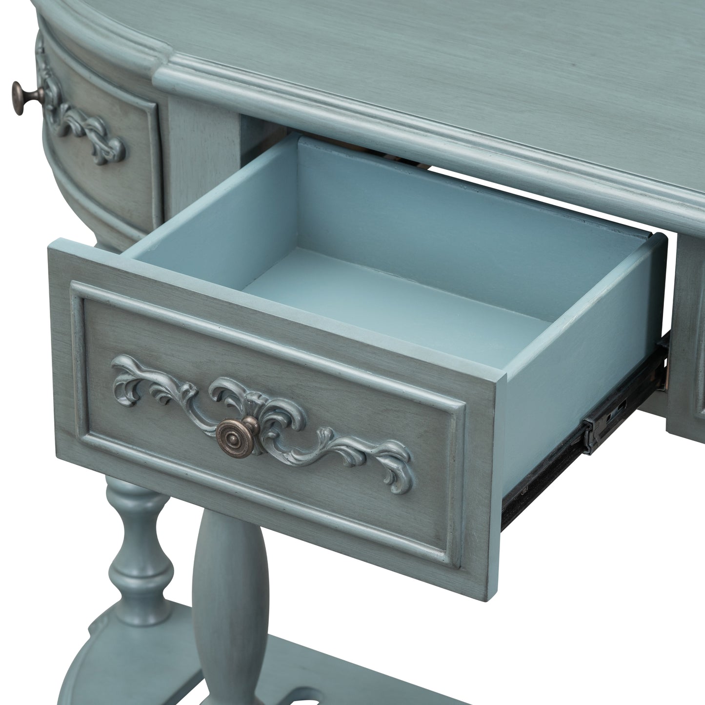 Light blue ornate vanity desk with one open drawer and brushed nickel hardware