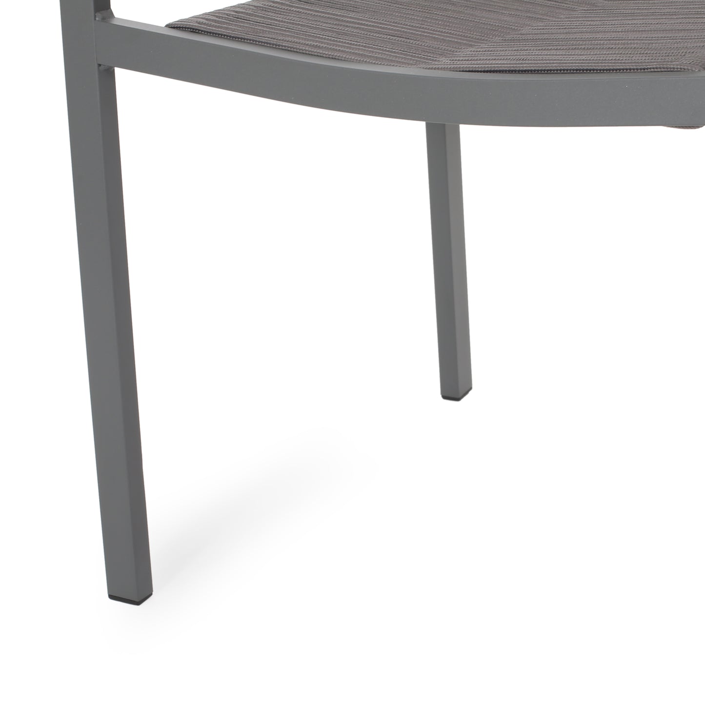 Closeup of a grey aluminum patio chair leg with woven seat detail