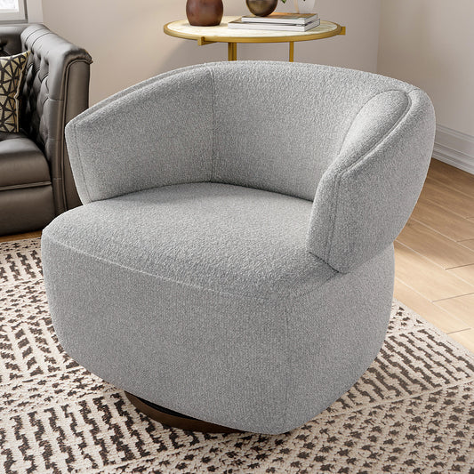 Grey boucl swivel armchair with curved back on a patterned rug