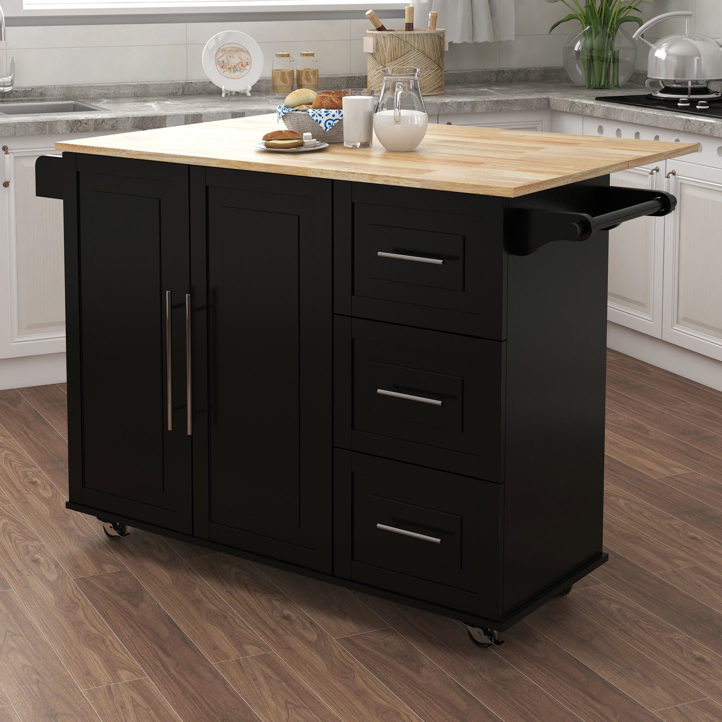 Black kitchen island with butcher block top and silver hardware