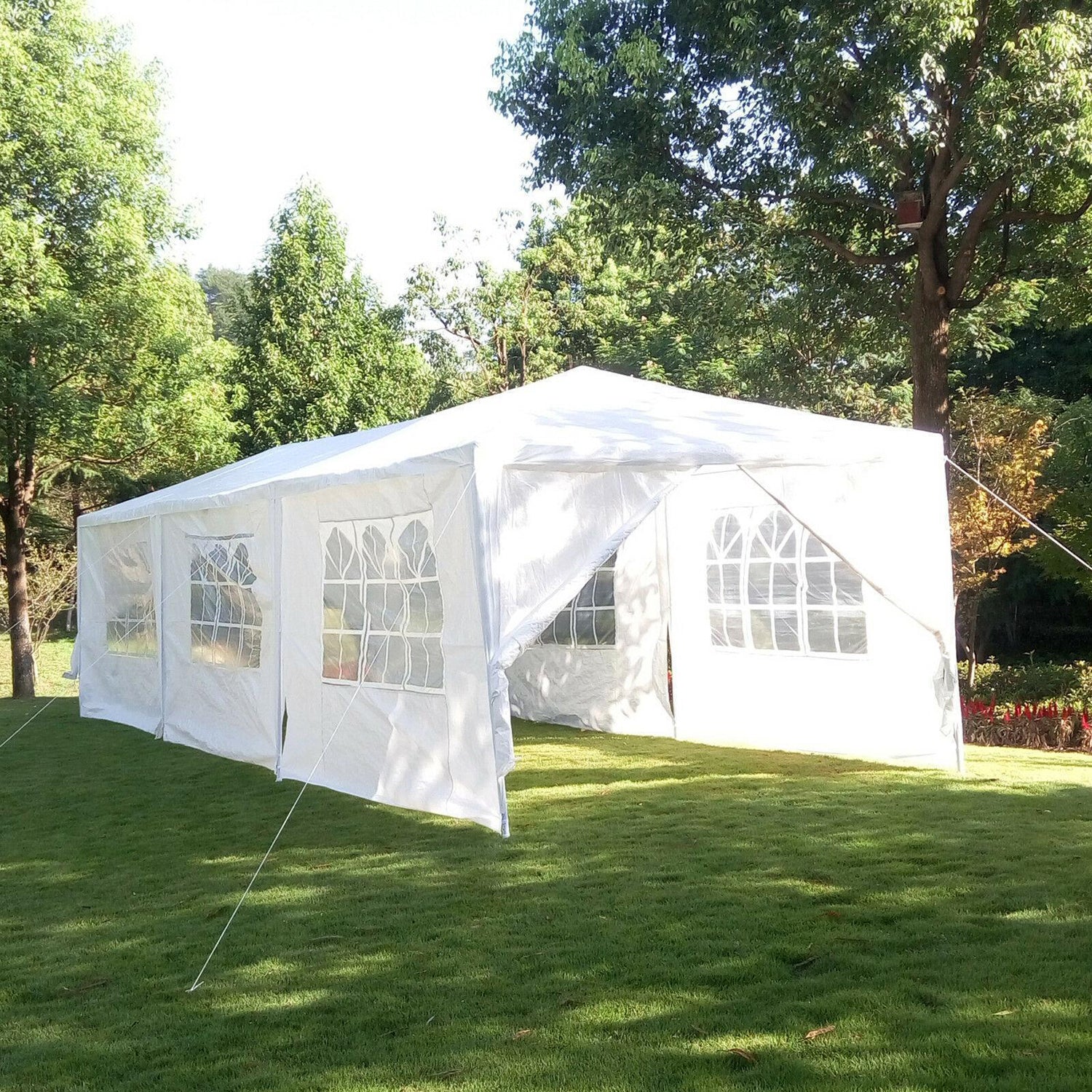 Spacious white party tent with clear windows ideal for outdoor events and gatherings