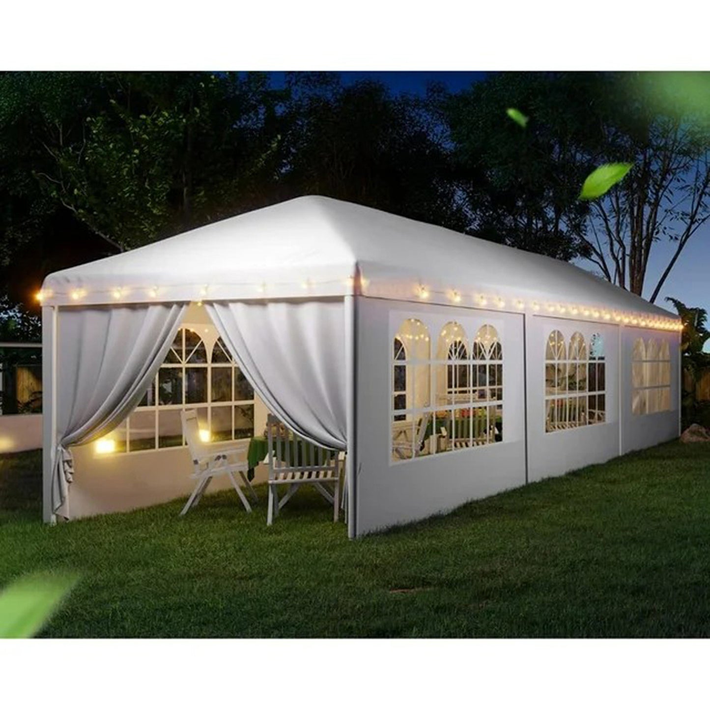 White event tent with arched windows and string lights perfect for outdoor parties