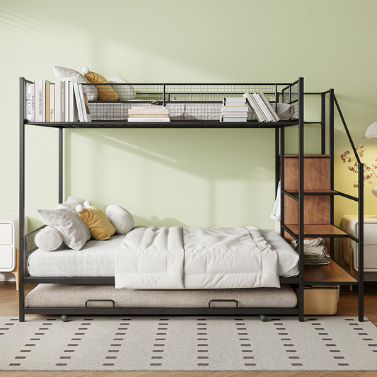 Black metal bunk bed with pullout trundle white linens and a stack of books on the upper bunk