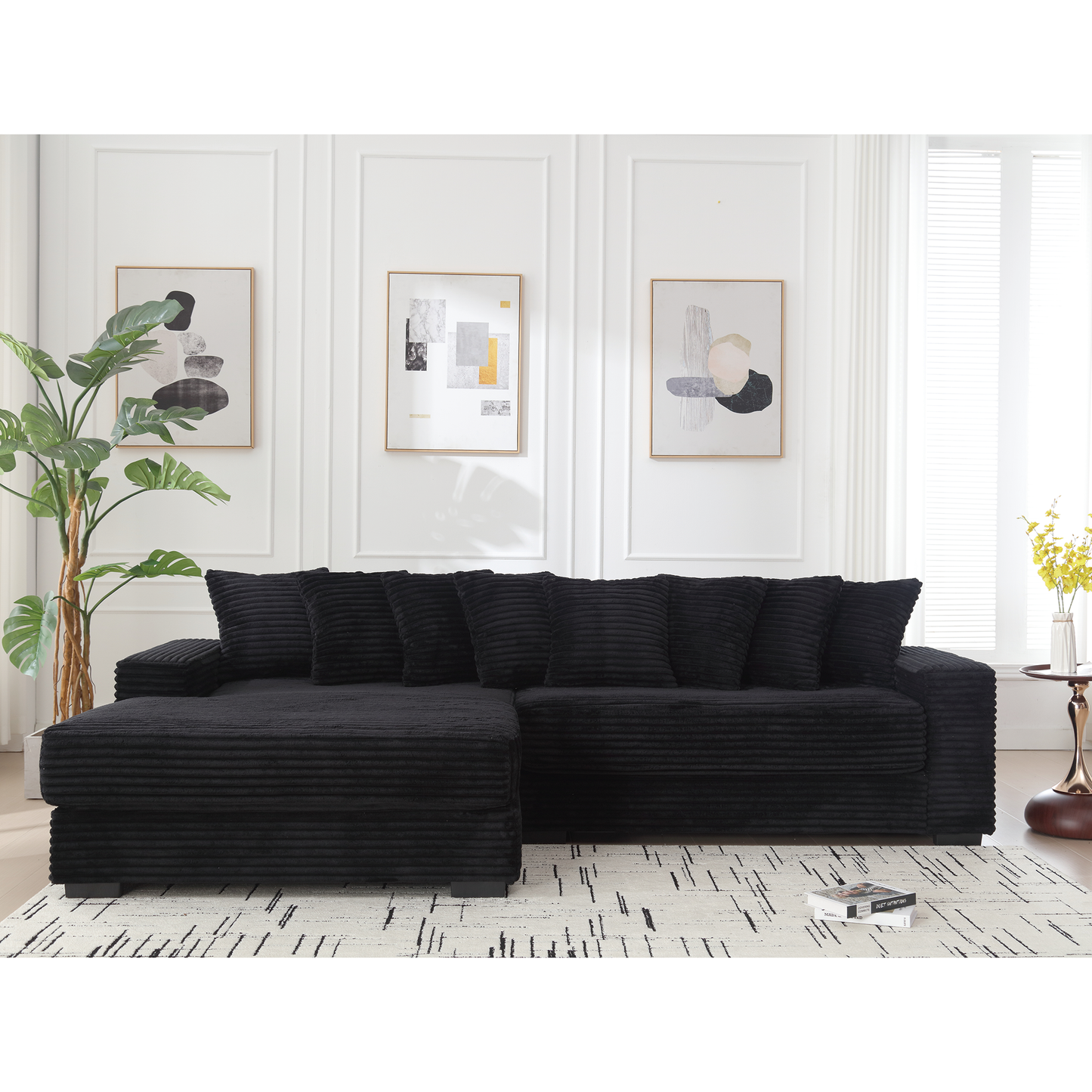 Luxurious black corduroy sectional sofa with plush cushions for ultimate comfort