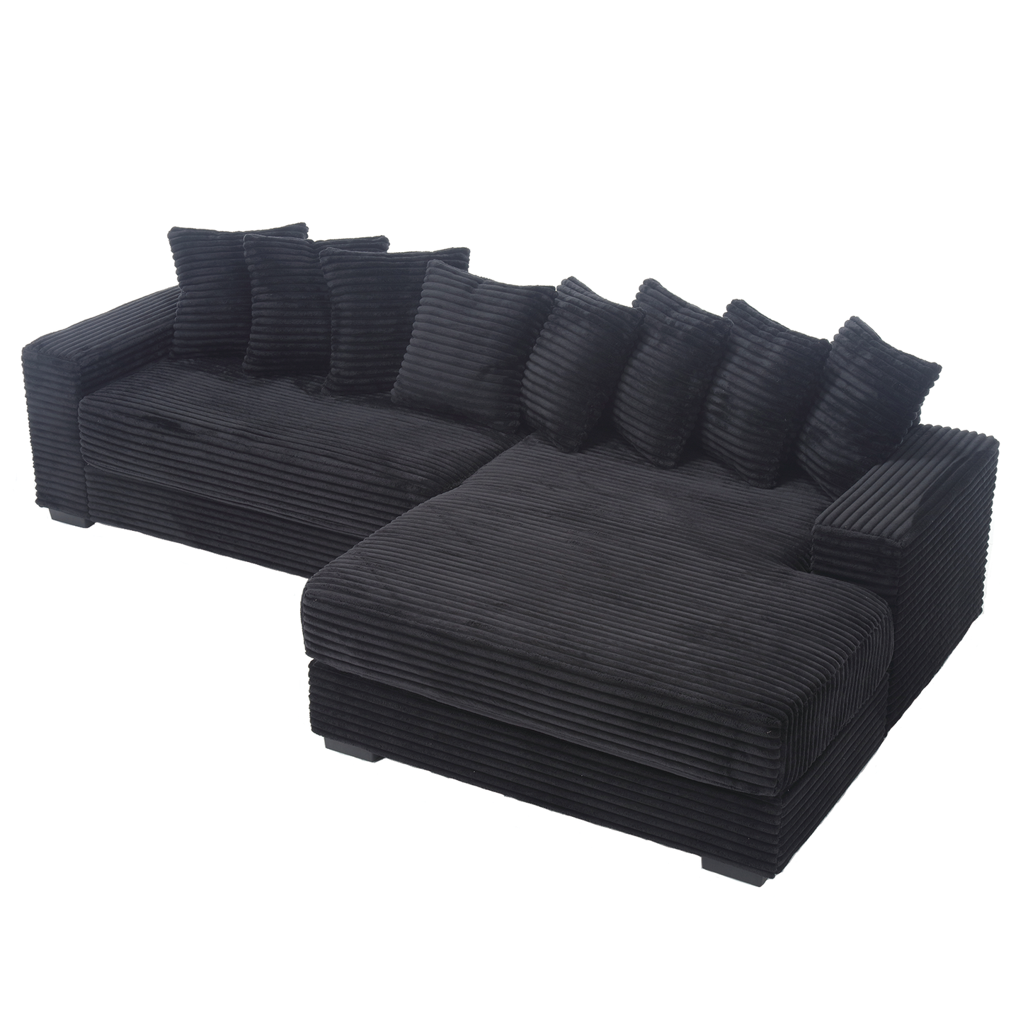 Black corduroy sectional sofa with plush throw pillows and a chaise lounge