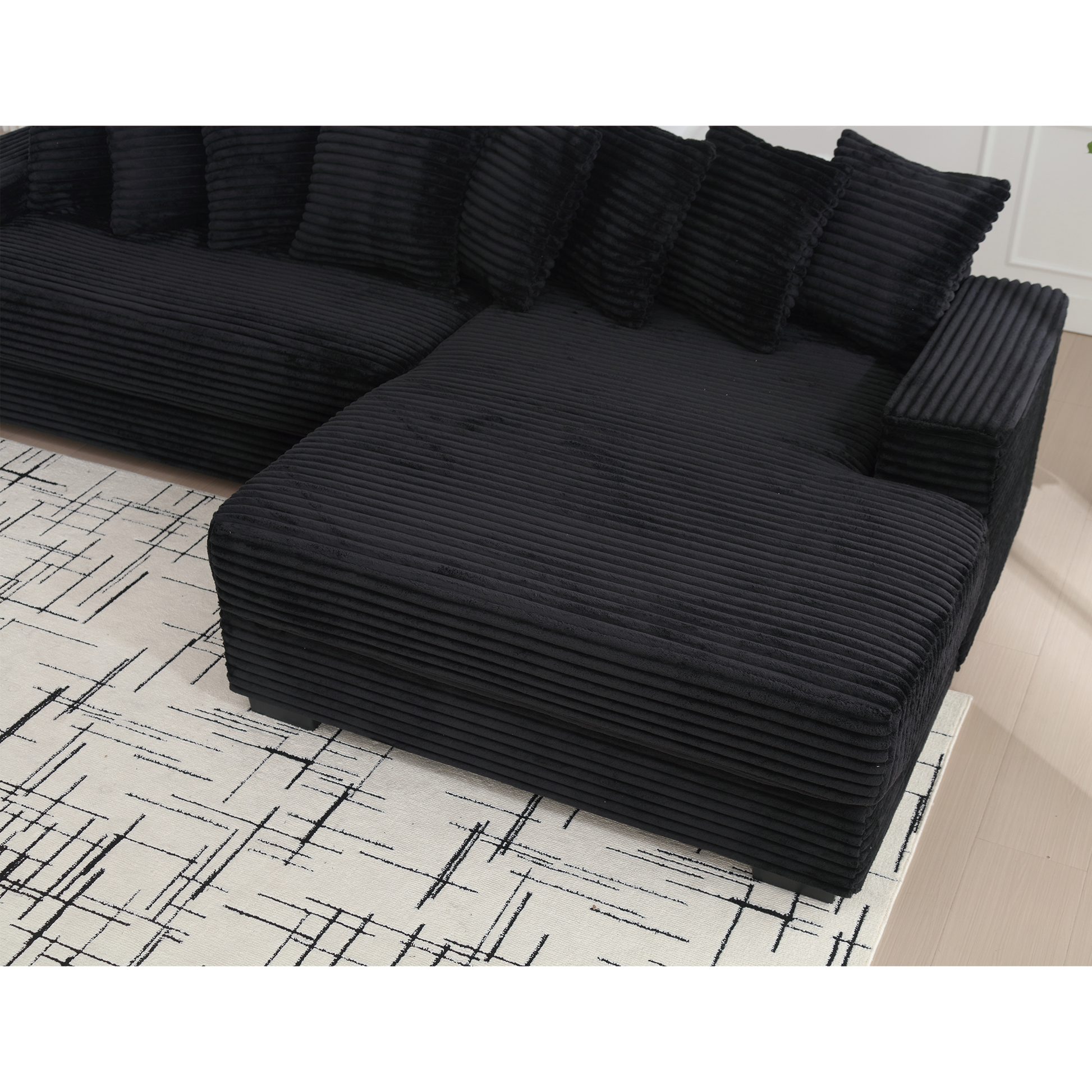 Black corduroy sectional sofa with plush cushions modern living room furniture