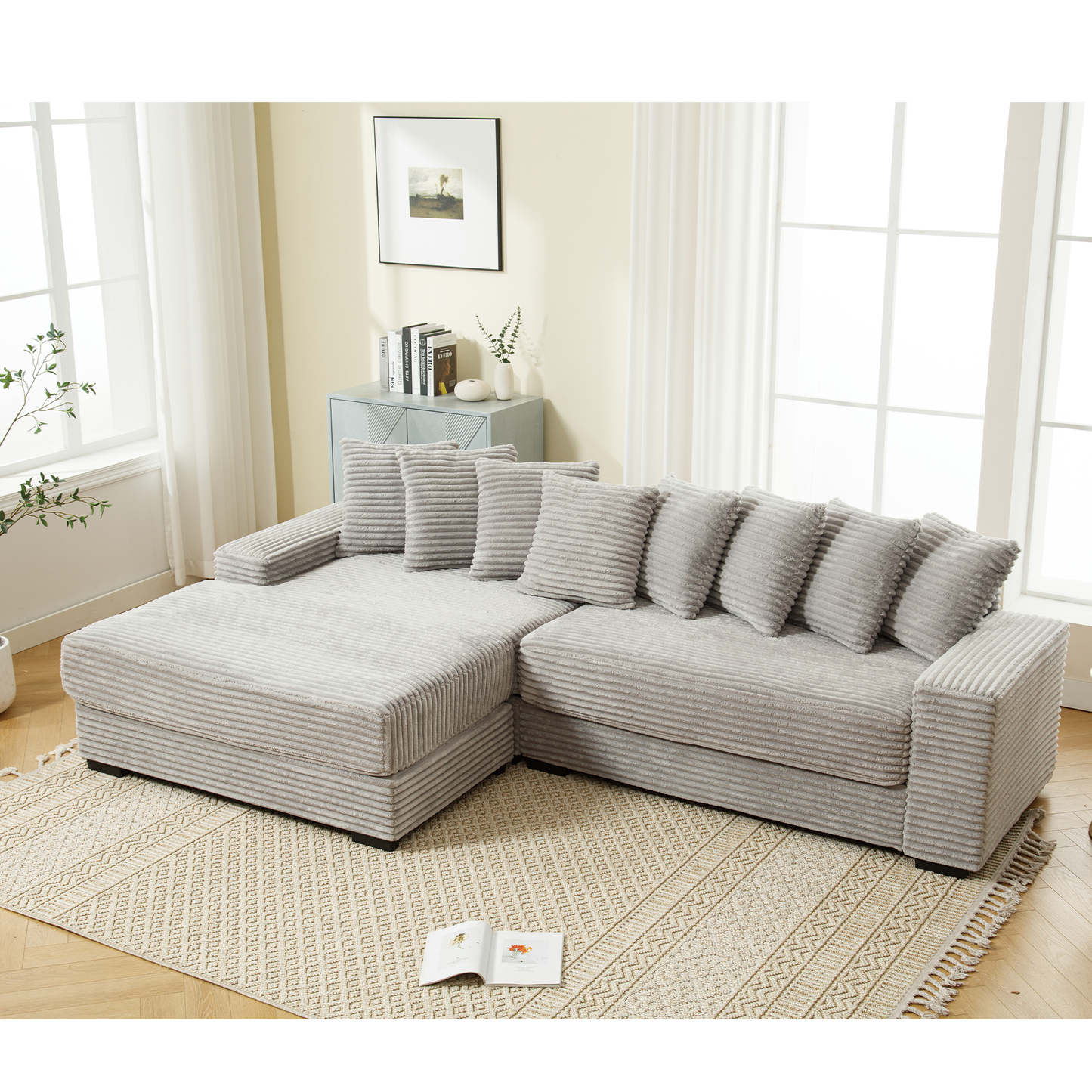 Plush grey corduroy sectional sofa with tufted cushions perfect for a cozy living room
