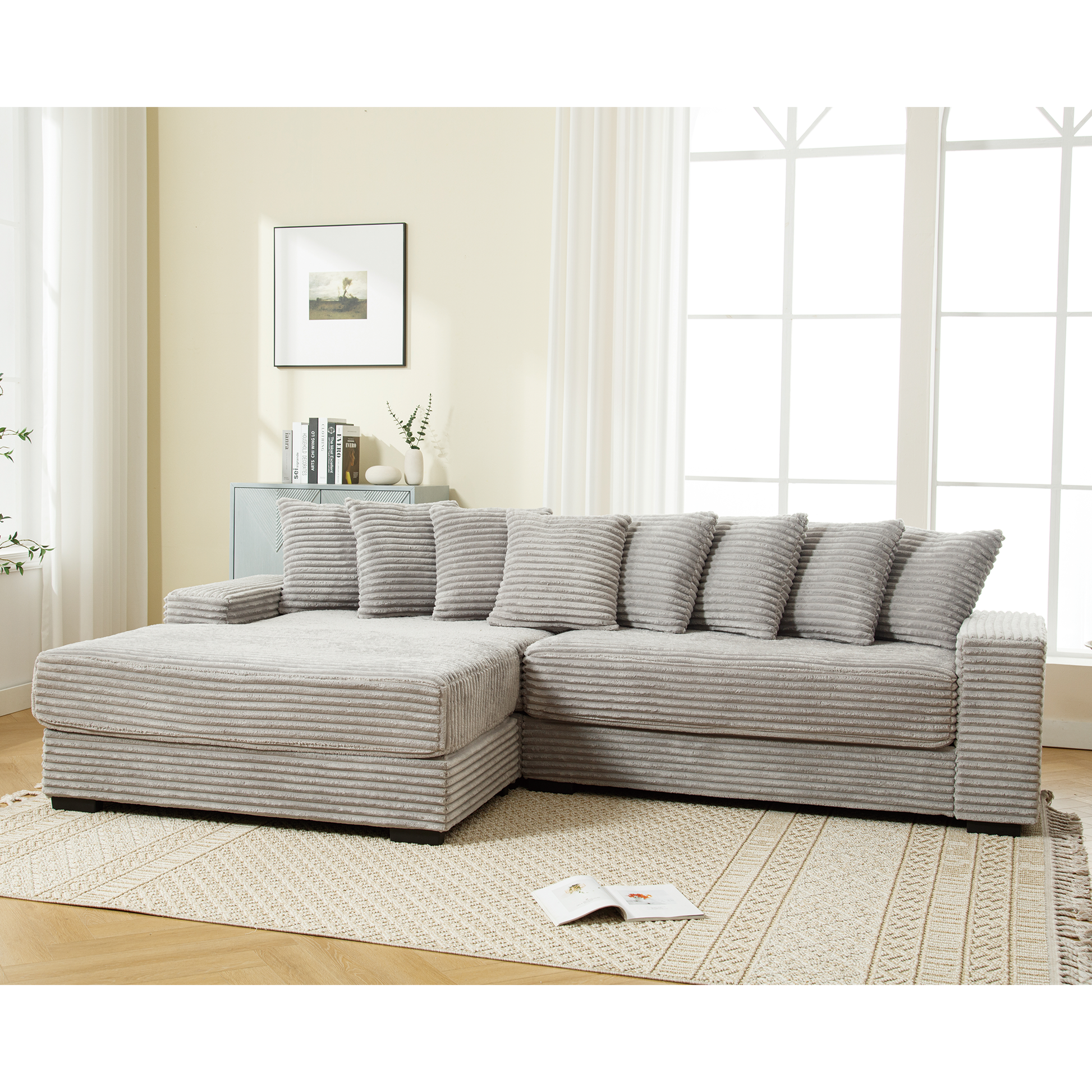 Light grey corduroy sectional sofa with plush throw pillows ideal for living room comfort