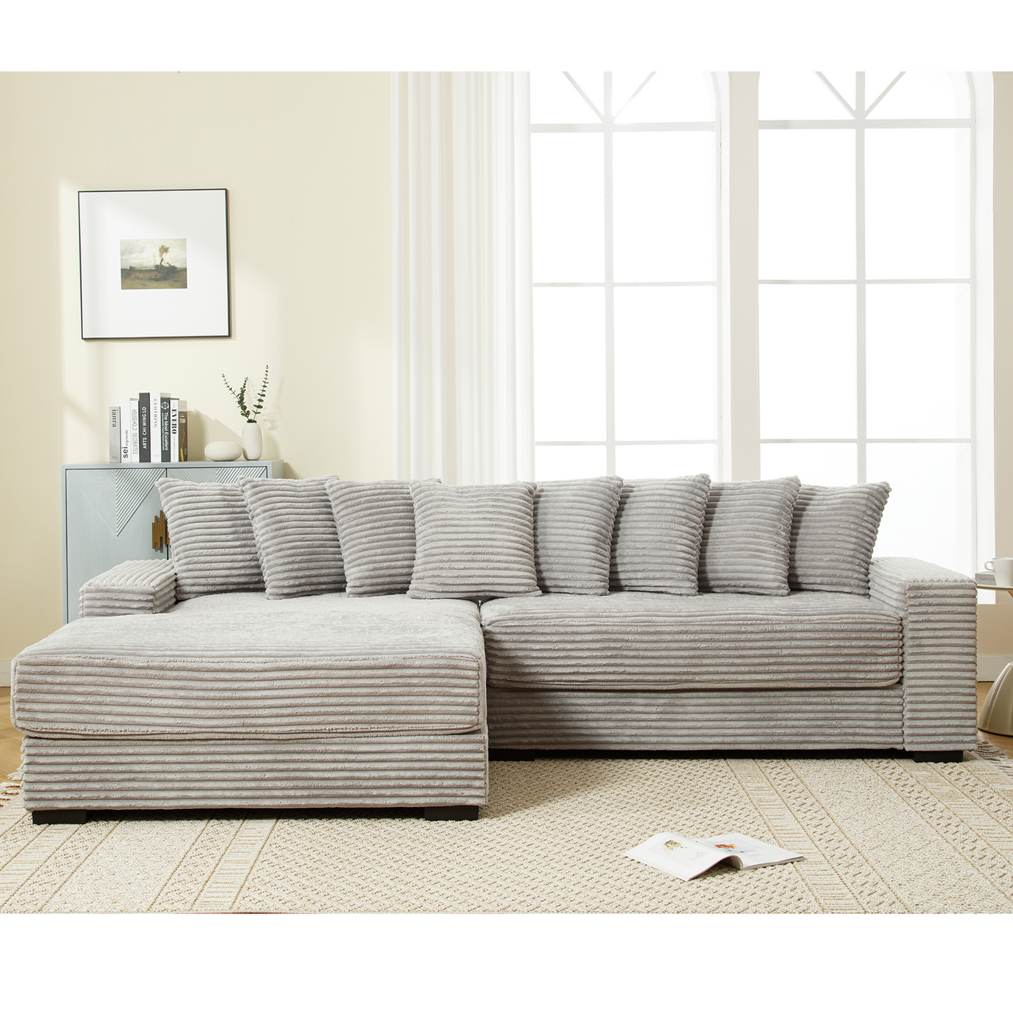 Plush grey corduroy sectional sofa with five matching throw pillows for ultimate comfort