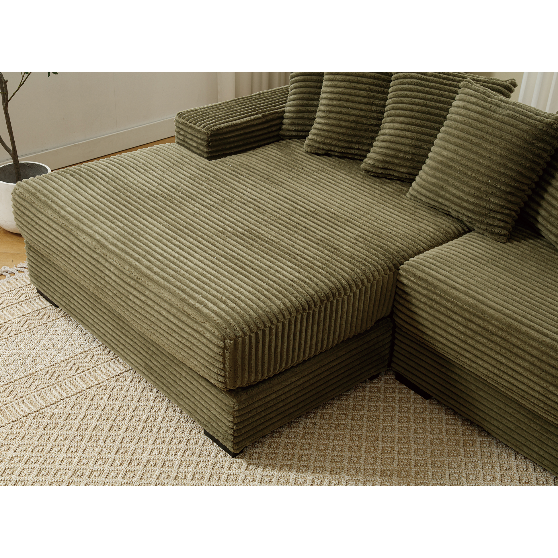 Olive green corduroy sectional sofa with plush cushions