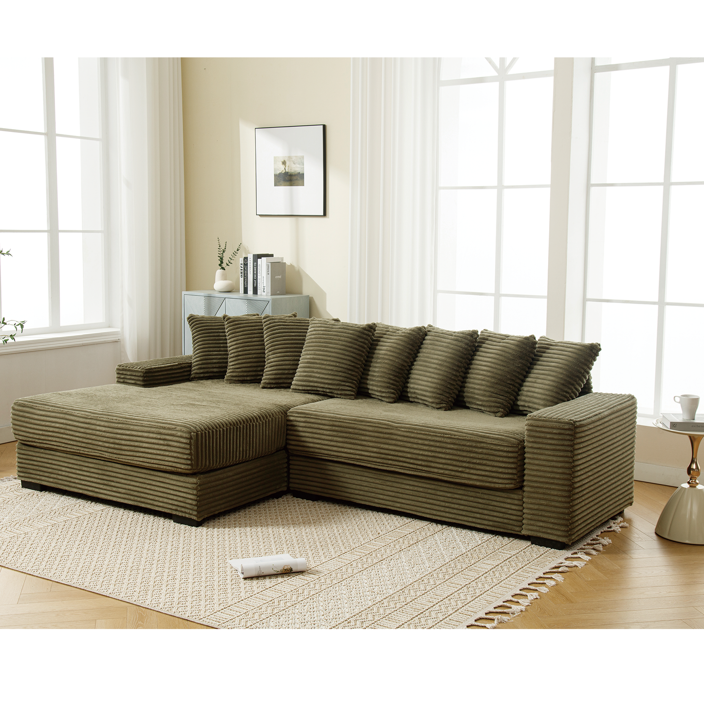 Olive green corduroy sectional sofa with plush cushions in a modern living room