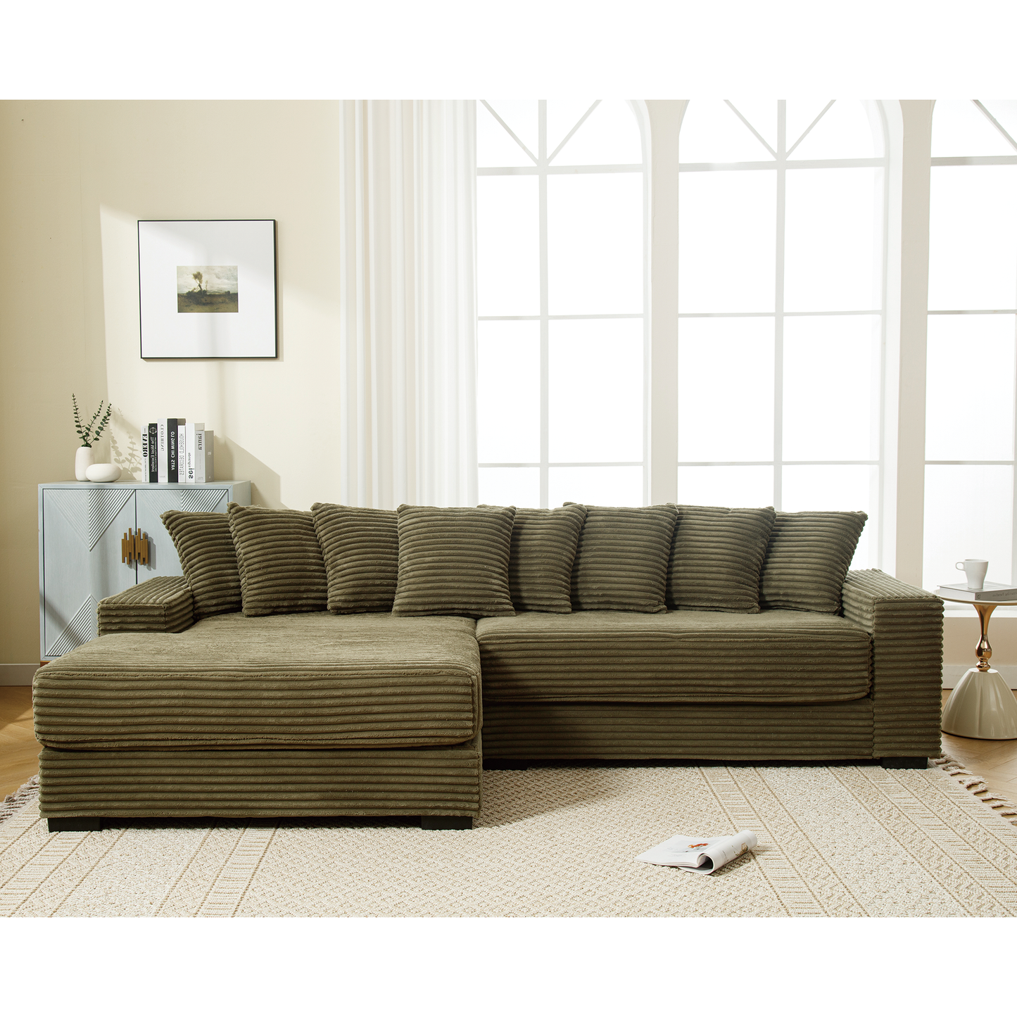 Olive green corduroy sectional sofa with plush cushions and chaise lounge