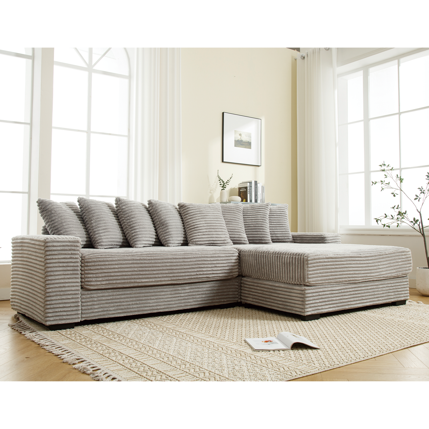 Textured gray corduroy sectional sofa with plush throw pillows modern living room furniture