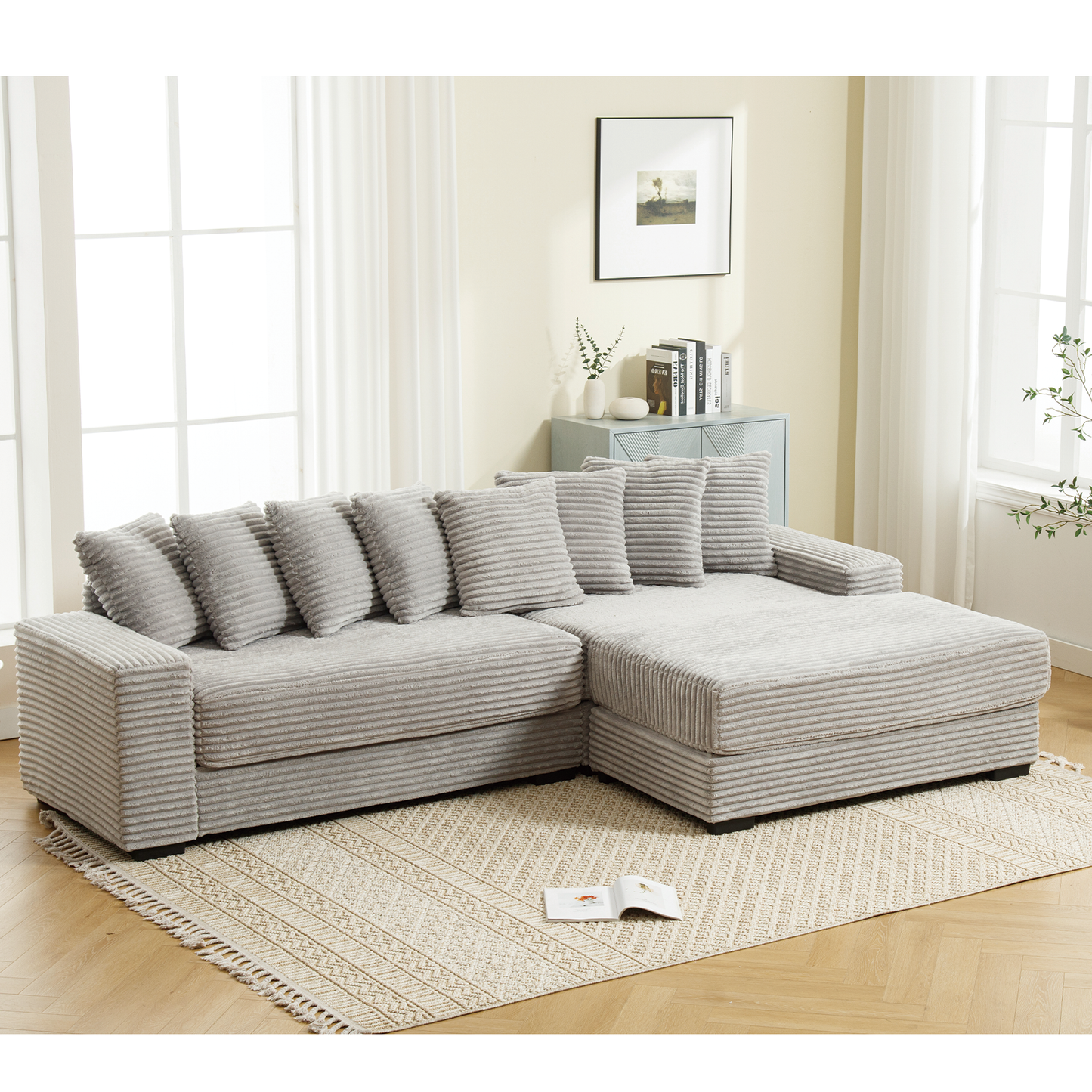 Light grey corduroy sectional sofa with plush cushions for comfortable living room seating