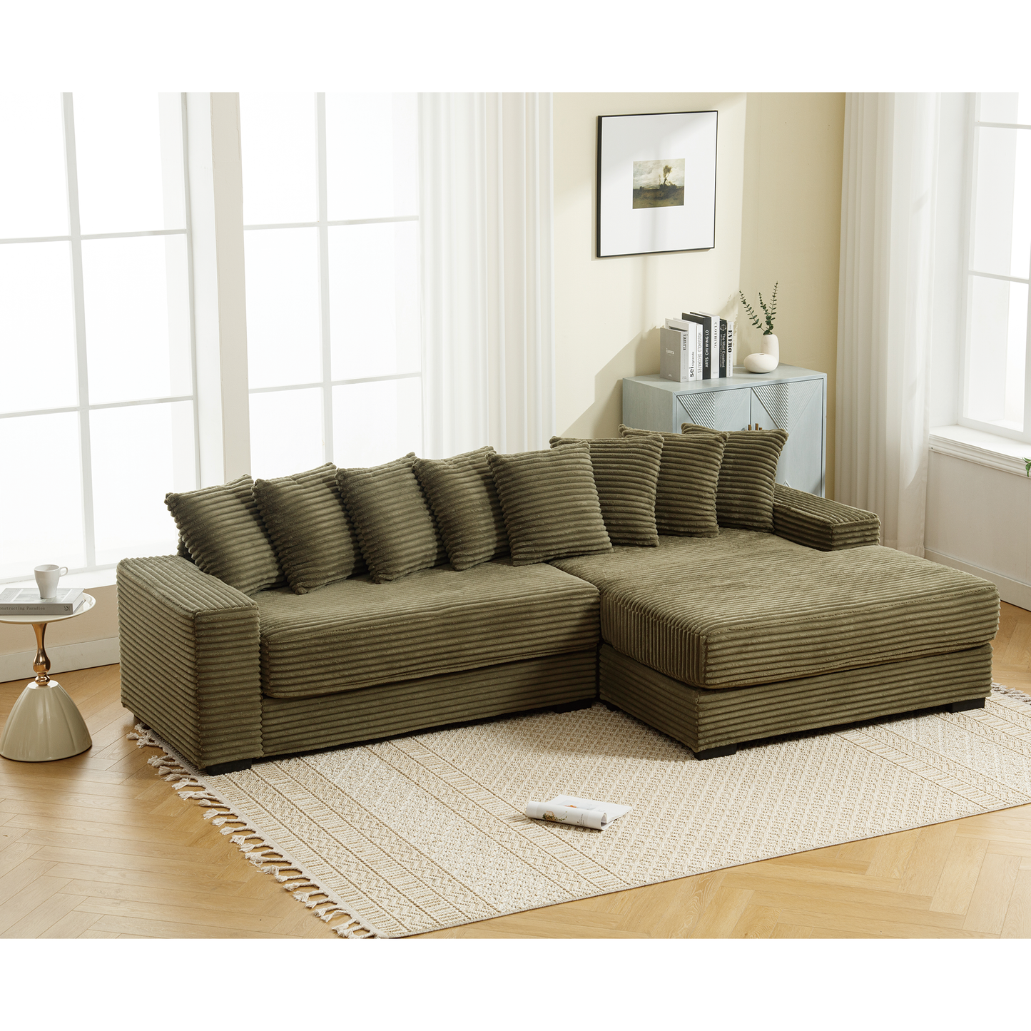 Olive green corduroy sectional sofa with plush cushions and chaise lounge