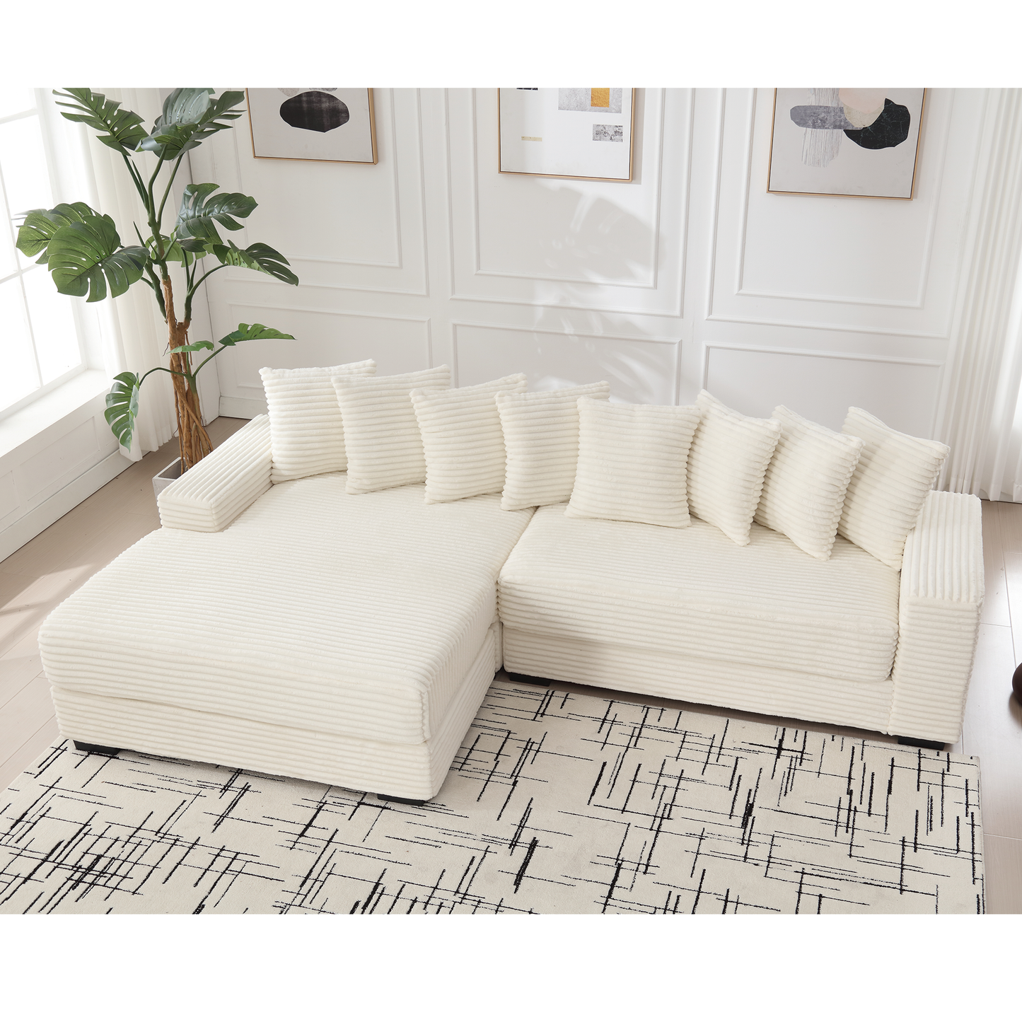 Cozy cream corduroy sectional sofa with plush pillows and chaise lounge for ultimate relaxation