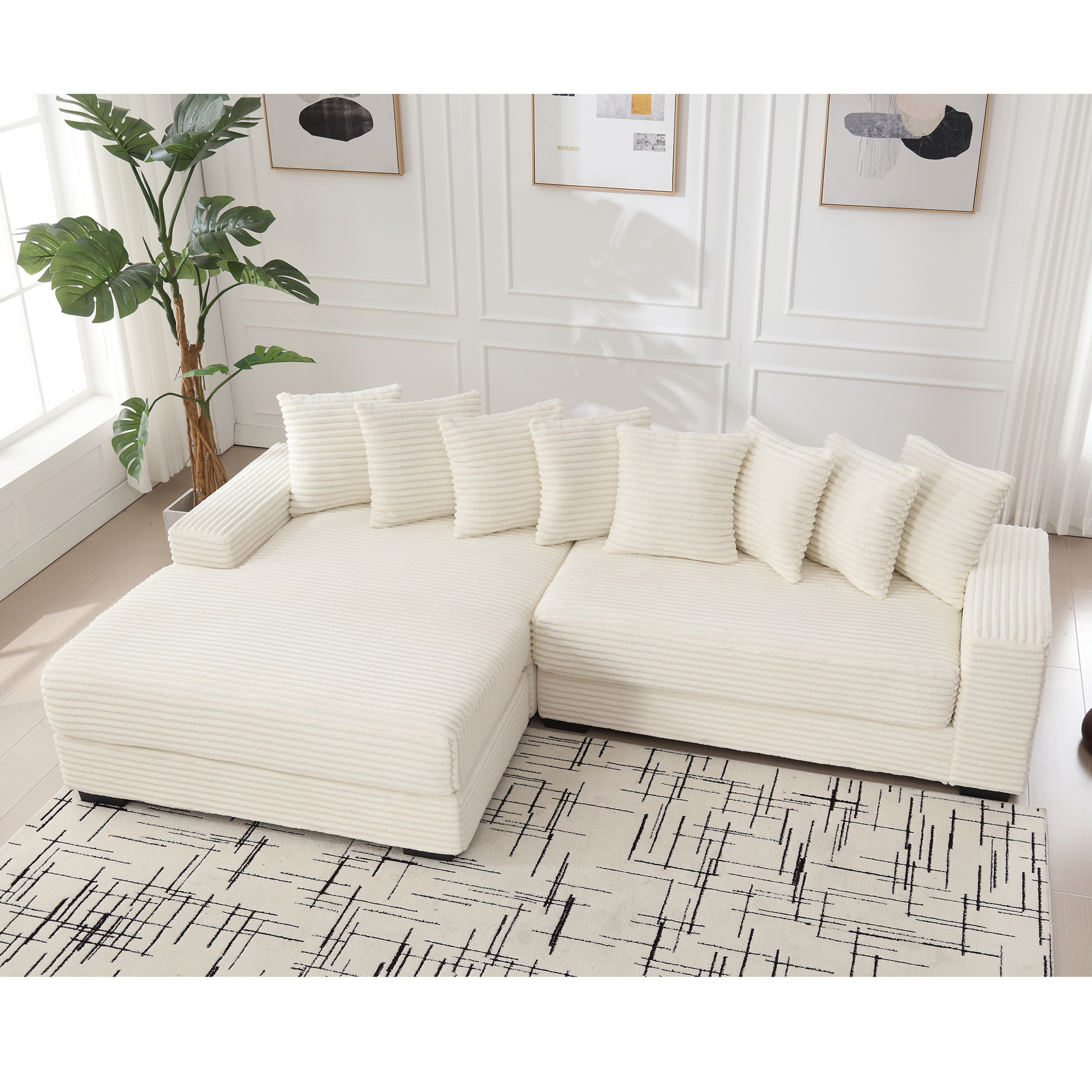 Cozy cream corduroy sectional sofa with plush pillows and chaise lounge for ultimate relaxation