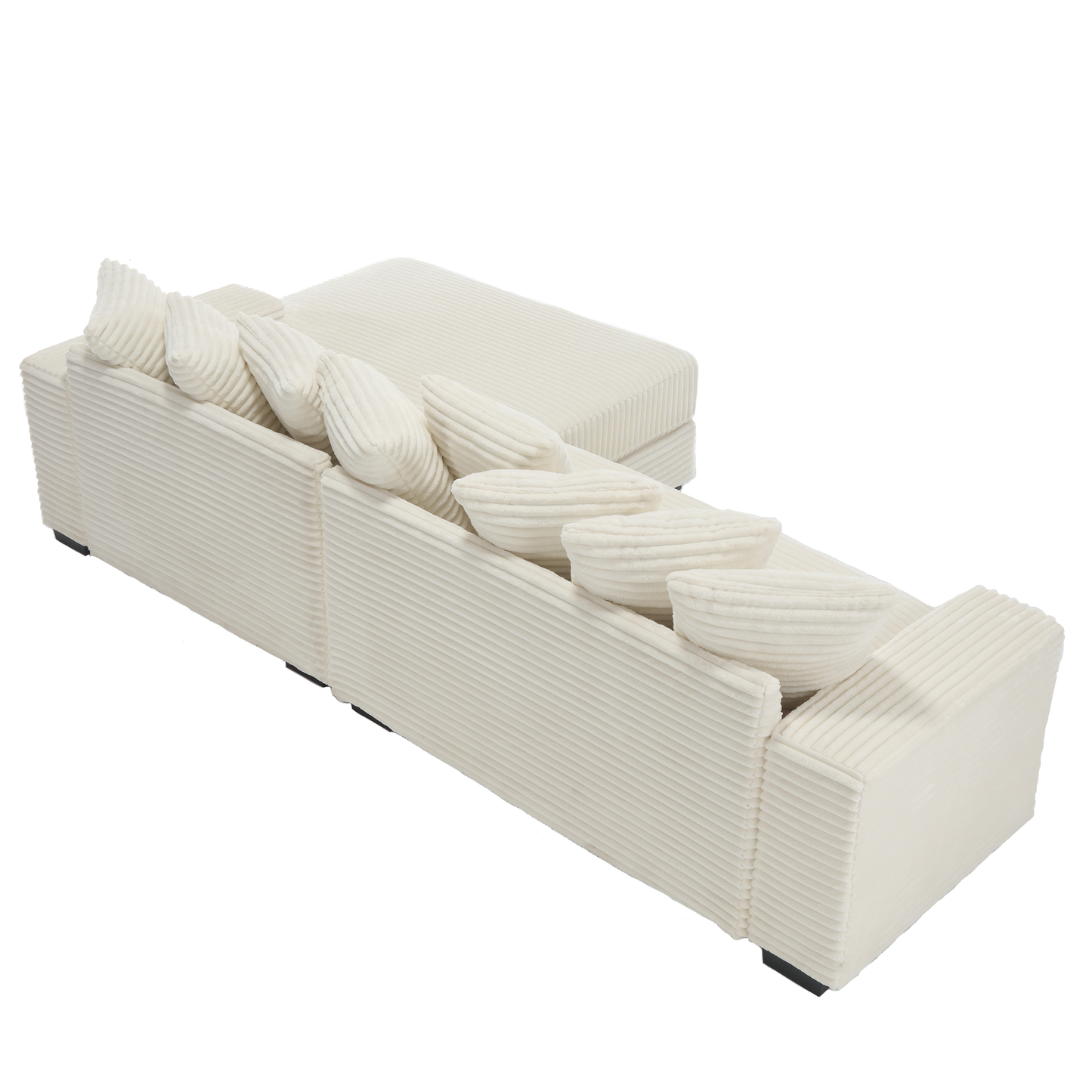 Plush cream corduroy sectional sofa with plush lumbar pillows and an ottoman section